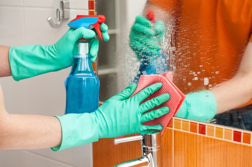 Professional upholstery cleaning for a living room sofa in Kensington