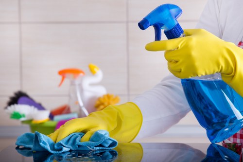 Technician cleaning hallway and stair carpets in Kensington property