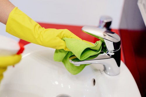 Cleaner preparing a Kensington home for a thorough domestic cleaning visit