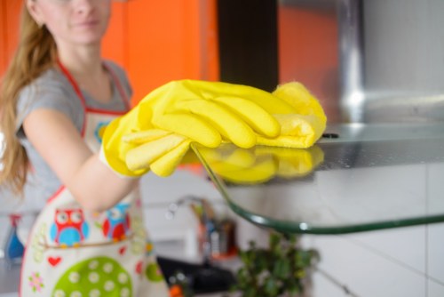 Local cleaning team preparing a Kensington flat for final inspection